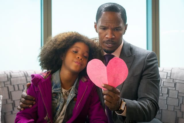 <p>Barry Wetcher/Sony/Village Roadshow/Kobal/Shutterstock</p> Quvenzhané Wallis and Jamie Foxx in "Annie"