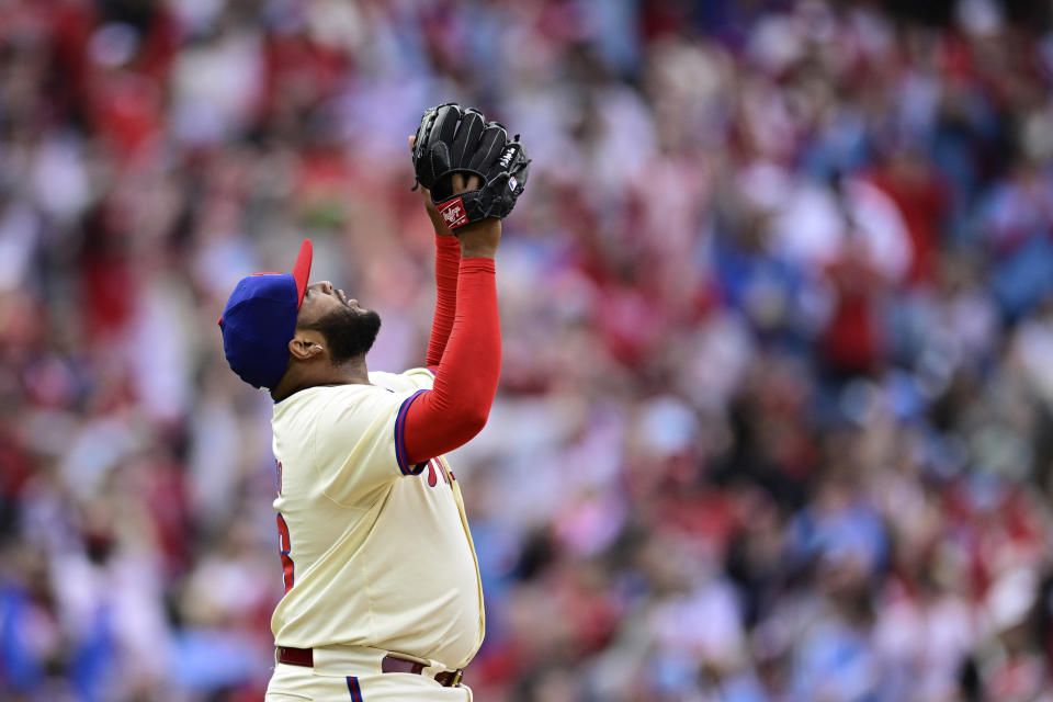 Philadelphia Phillies' Jose Alvarado reacts after the team's victory over the Atlanta Braves in a baseball game Sunday, March 31, 2024, in Philadelphia. (AP Photo/Derik Hamilton)