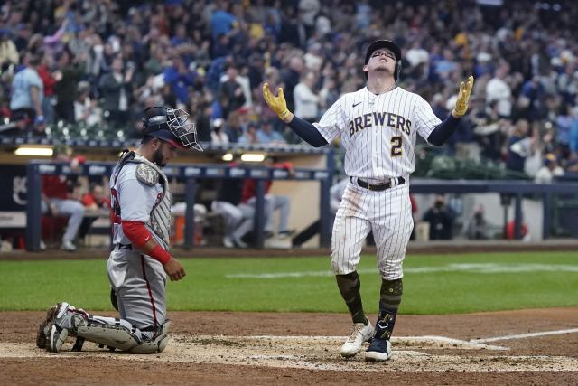 McCutchen, Urías homer, Woodruff goes 6 in Brewers' 5-1 win - The