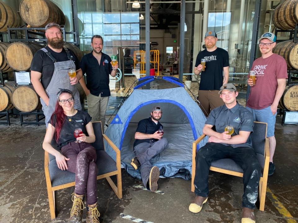 Group photo of Fat Hill Brewing employees at SingleSpeed Brewing Co. in Waterloo during a collaboration brewing day for RAGBRAI.