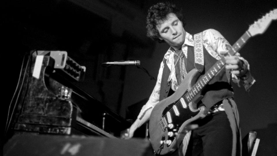 Nils Lofgren performs on stage in Amsterdam, Netherlands, 1975.