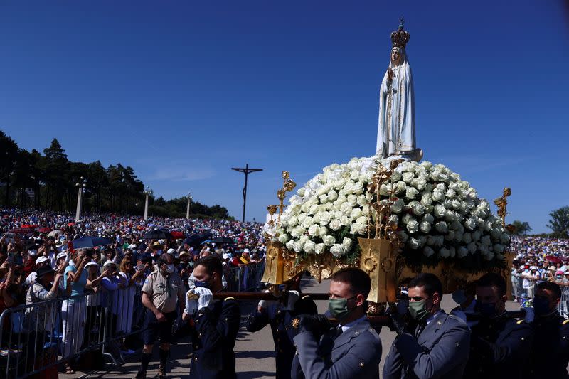 Event marking the anniversary of the reported appearance of the Virgin Mary to three shepherd children, at the Catholic shrine of Fatima, in Fatima