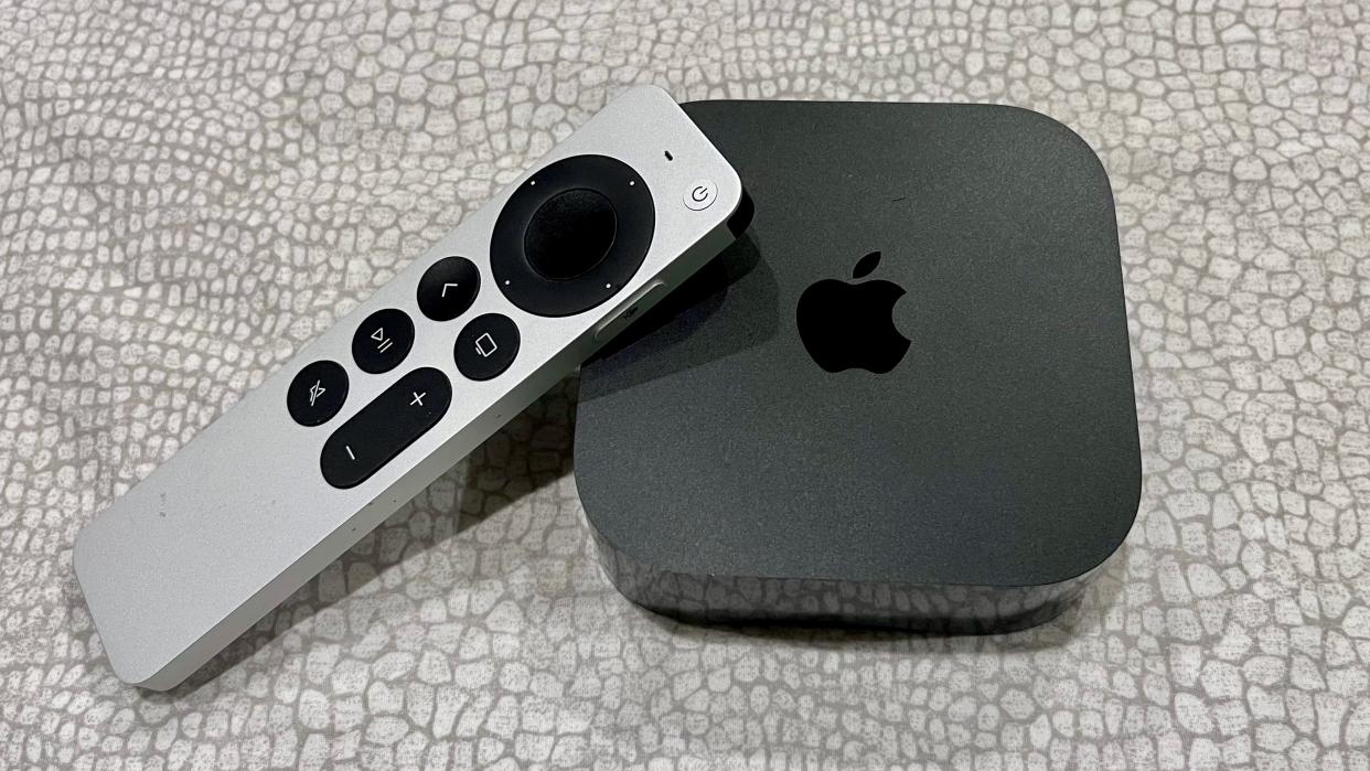  Apple TV 4K 2022 and Siri remote on white background 