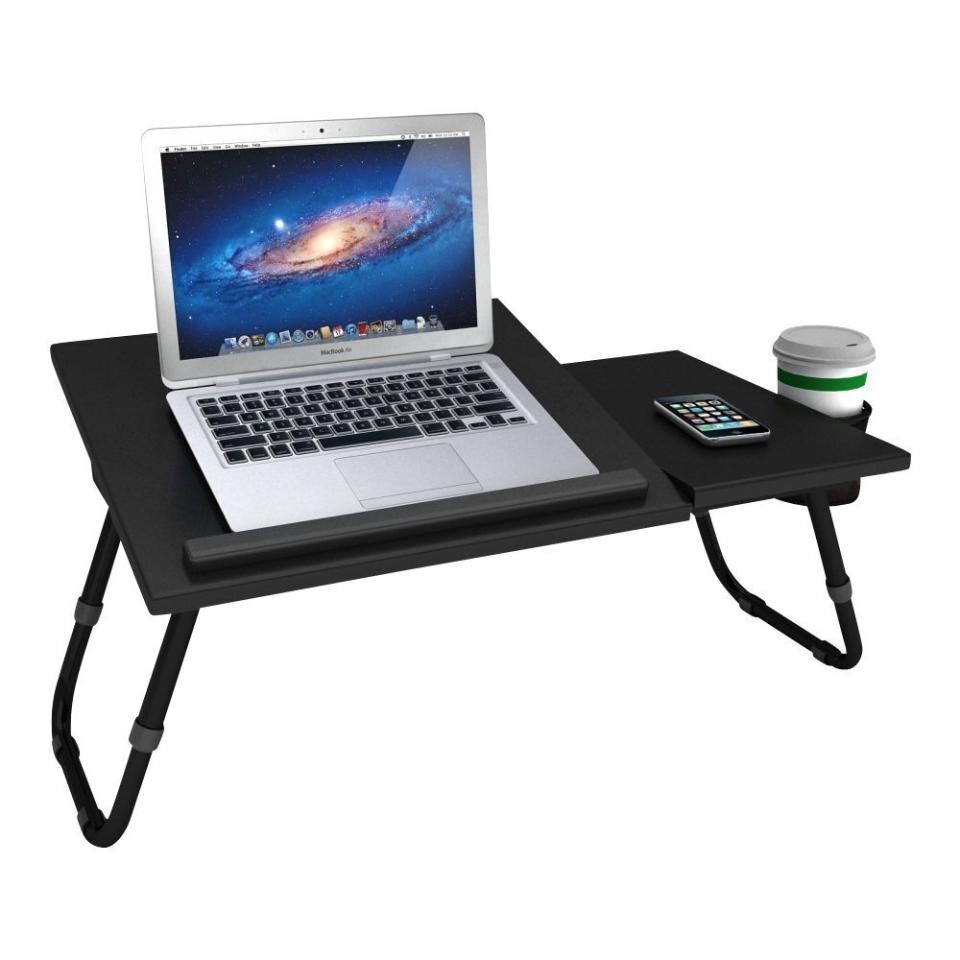 Type the day away with this laptop tray. <a href="https://fave.co/33KZz2V" target="_blank" rel="noopener noreferrer">Find it for $36 at Best Buy</a>.&nbsp;