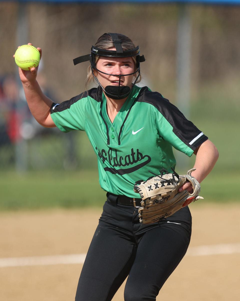 Mogadore pitcher Katie Gardner turns to make a throw to first base during Monday night’s game against the Rovers at Rootstown High School.