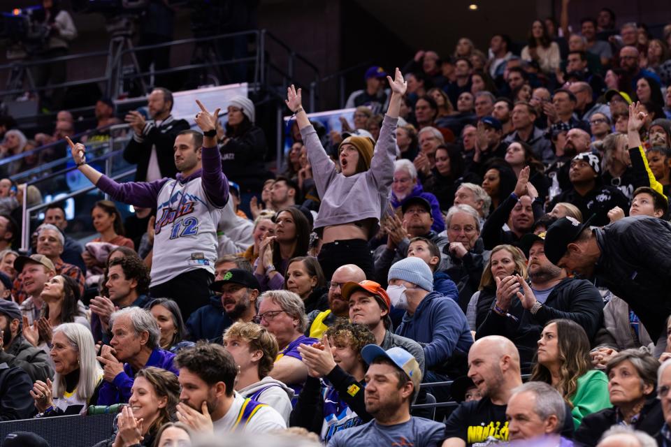 Fans cheer after a 3-pointer during an NBA basketball game between the Utah Jazz and the New Orleans Pelicans at the Delta Center in Salt Lake City on Monday, Nov. 27, 2023. | Megan Nielsen, Deseret News