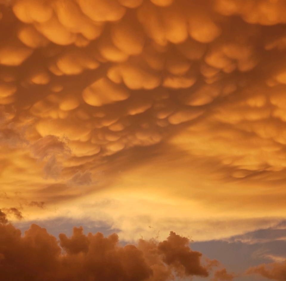 Alexander Johnson took this photo from Melrose Village in Wooster, Ohio, at about 9 p.m. Wednesday as Wayne and Holmes counties were under a tornado warning. Mammatus clouds, pouches that form on the lower surface of cumulonimbus clouds, can bring hail, rain and lightning.