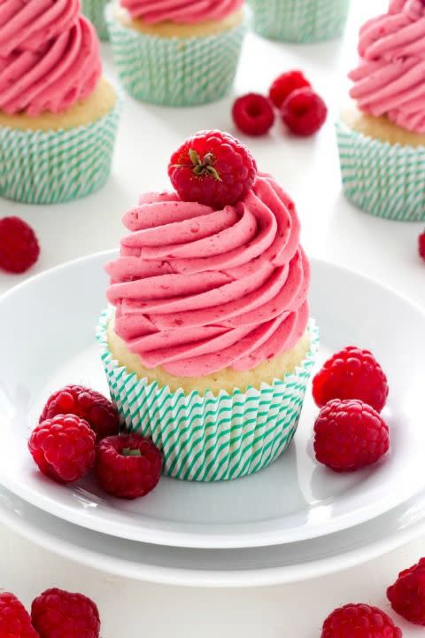 <p>These lemon cupcakes topped with a bright raspberry buttercream are the perfect spring treat.</p><p><strong><a href="http://bakerbynature.com/lemon-cupcakes-with-raspberry-buttercream/" rel="nofollow noopener" target="_blank" data-ylk="slk:Get the recipe at Baker by Nature.;elm:context_link;itc:0;sec:content-canvas" class="link ">Get the recipe at Baker by Nature.</a></strong></p>