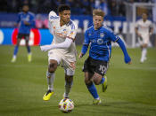 CF Montreal's Bryce Duke (10) chases FC Cincinnati's Ian Murphy during the first half of an MLS soccer match Saturday, April 13, 2024, in Montreal. (Peter McCabe/The Canadian Press via AP)