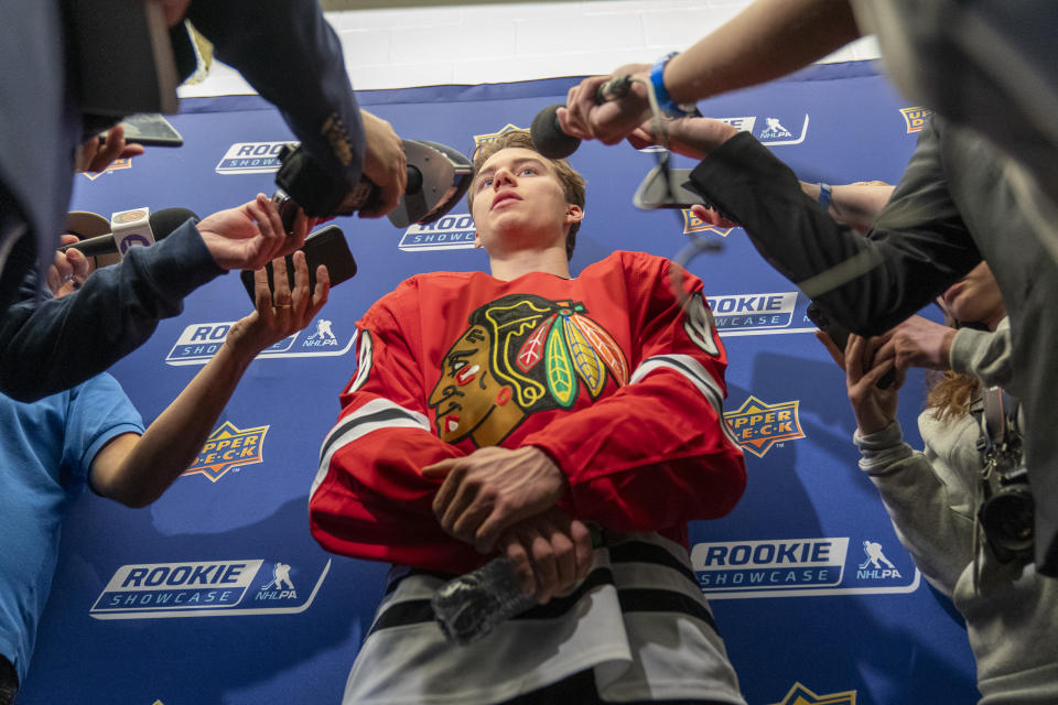 Chicago Blackhawks hockey player Connor Bedard, the number one overall draft pick, talks with reporters during the NHL Players Association rookie showcase, Tuesday, Sept. 5, 2023 in Arlington, Va. (AP Photo/Alex Brandon)