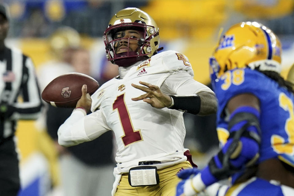 Boston College quarterback Thomas Castellanos (1) looks to throw a pass during the first half of the team's NCAA college football game against Pittsburgh, Thursday, Nov. 16, 2023, in Pittsburgh. (AP Photo/Matt Freed)