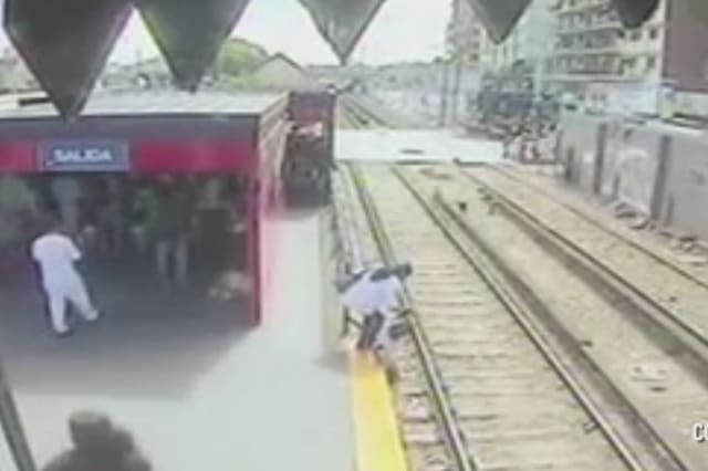 Woman lets daughter walk on tracks to avoid paying train fare