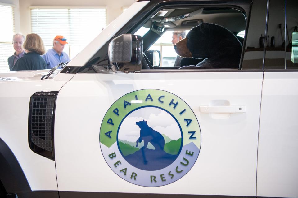 Plush black bears adorn the Land Rover Defender 130 SUV awarded to Appalachian Bear Rescue as part of Land Rover USA's Defender Service Awards during an event at Land Rover Knoxville on Tuesday, Feb. 21, 2023. 