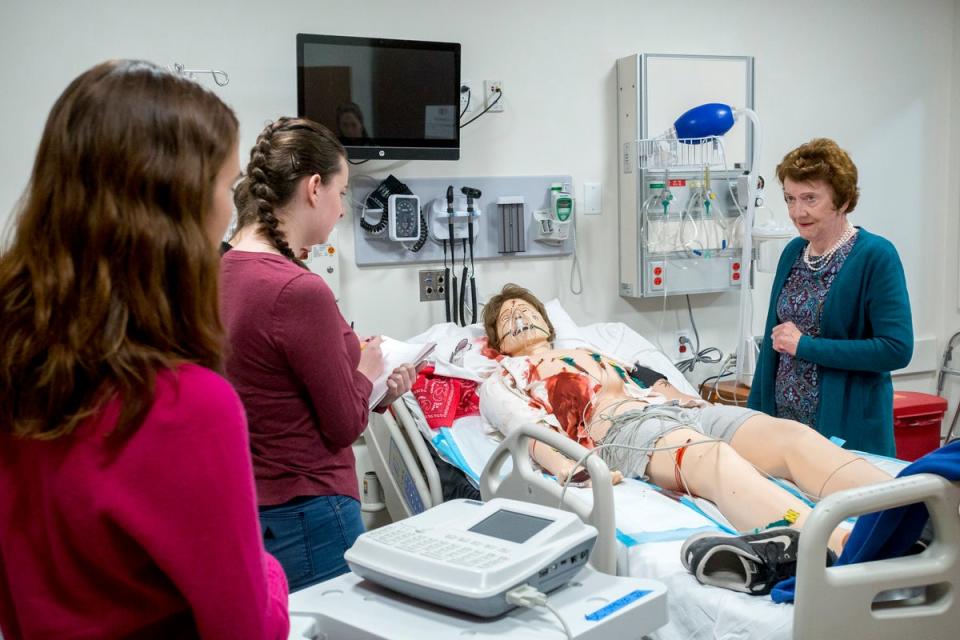 Burgess is pictured at her crime scene lab at Boston College's Connell School of Nursing in 2016 (Caitlin Cunningham Photography for Boston College)