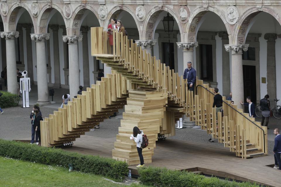 FILE - This Tuesday, April 8, 2014 file photo shows the installation "Scale Infinite" displayed at the Milan Design Fair, in Milan, Italy. The sprawling Milan Furniture Show, which closes Sunday, April 13, 2014, is the largest and most prestigious in the world, capitalizing on Italian excellence in furniture design and craftsmanship. The weeklong happening, which spills out into Milan venues with numerous side events, is also increasingly the launching pad for high-level collaborations among the fashion, architecture, technological and design worlds. (AP Photo/Luca Bruno, file)