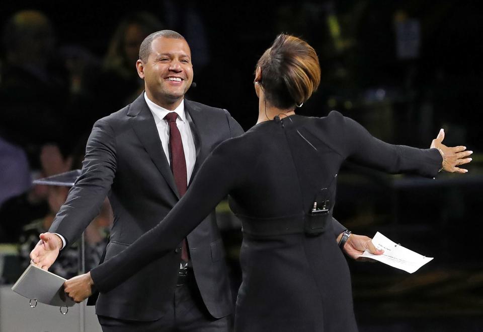 Cleveland Cavaliers President of Basketball Operations Koby Altman hugs host Maria Taylor during the 22nd Greater Cleveland Sports Awards at Rocket Mortgage FieldHouse on Wednesday.