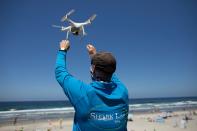 Marine biologists from Cal State Lone Beach Shark Lab study sharks along the California coast