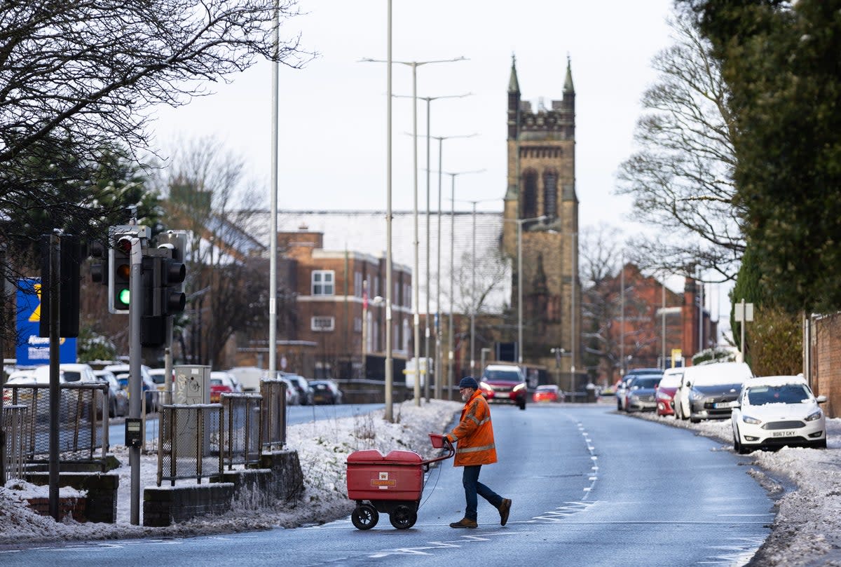 A postal worker in Liverpool, January 2024 (EPA)