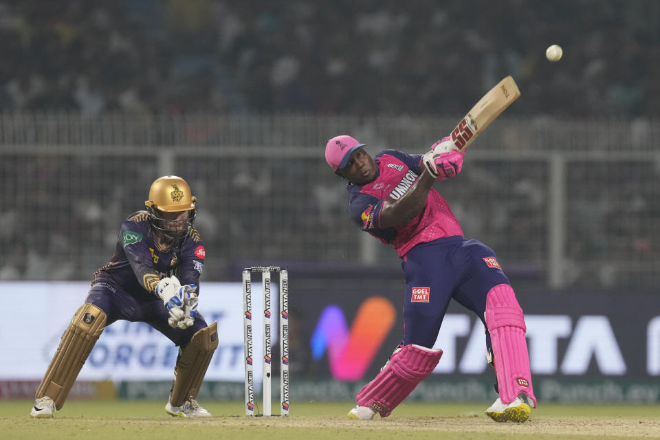 Rajasthan Royals' Rovman Powell plays a shot during the Indian Premier League cricket match between Kolkata Knight Riders and Rajasthan Royals in Kolkata, India, Tuesday, April 16, 2024. (AP Photo/Bikas Das)