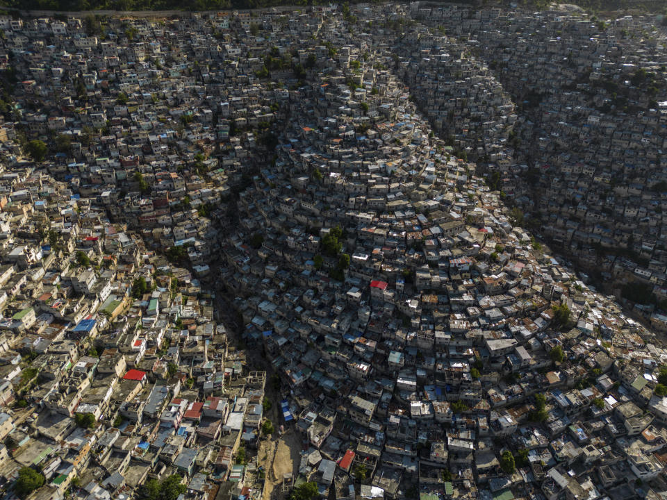 Houses sit on the slopes of the Jalousie neighborhood in Port-au-Prince, Haiti, Monday, May 13, 2024. (AP Photo/Ramon Espinosa)