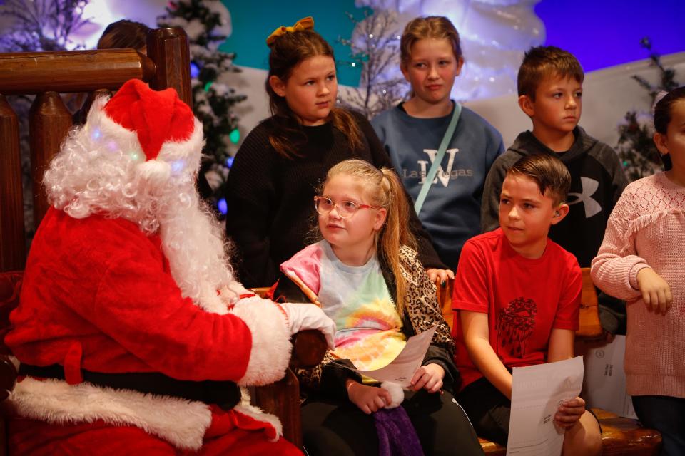 Willard School District deaf and hard-of-hearing students talk with Santa Claus at Bass Pro Shops on Friday, Dec. 8, 2023. From 9-11:30 a.m., an American Sign Language-fluent Santa was available for photos with deaf and hard-of hearing children.