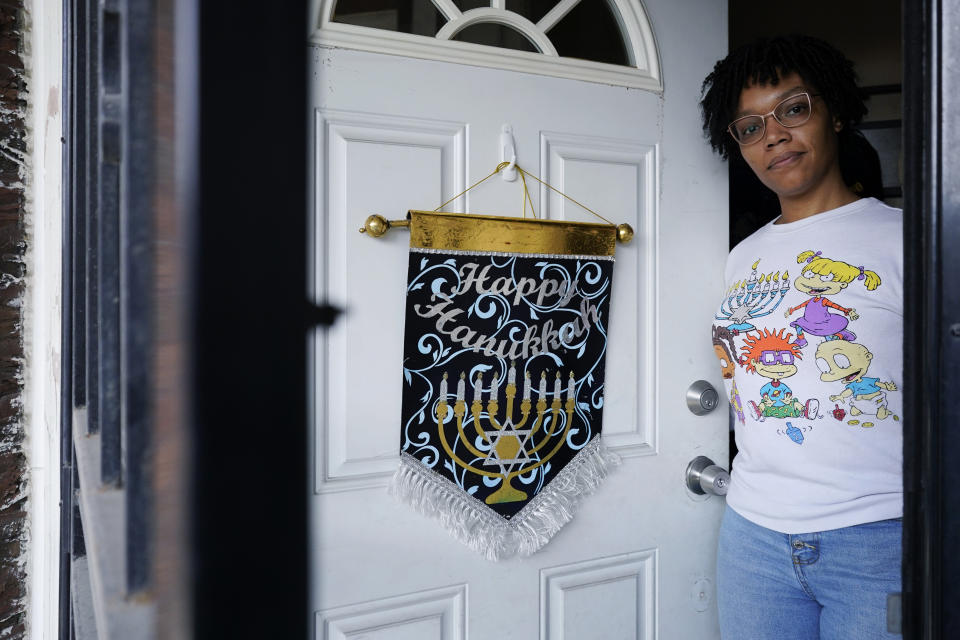 FILE - Cydney Wallace poses for a photo in Chicago, Tuesday, Nov. 28, 2023. Cydney Wallace is a Black Jewish woman who recently went on a trip to Israel and the West Bank through a trip called "Black Jerusalem" that was focused on exploring "the sacred geography of Jerusalem through a framework that privileges a Black American and an African lens." (AP Photo/Nam Y. Huh, File)