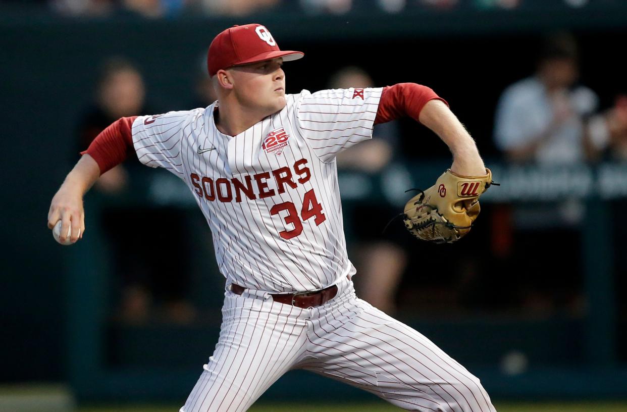 Oklahoma's Carson Atwood (34) throws a pitch during the Bedlam baseball game between the University of Oklahoma Sooners and the Oklahoma State University Cowboys at L. Dale Mitchell Park in Norman, Okla., Thursday, May, 18, 2023. 