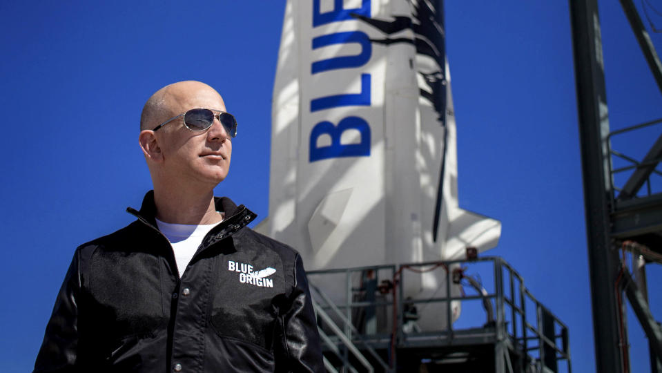 Jeff Bezos, founder of Blue Origin, inspects New Shepard’s West Texas launch facility before the rocket’s maiden voyage. (Blue Origin)