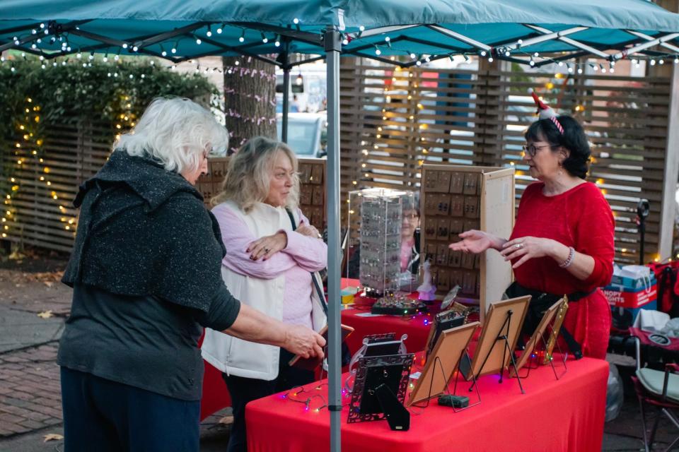 Local artisans and makers sell their goods at a previous Thanksmas Market and Holiday Celebration in downtown Fall River.