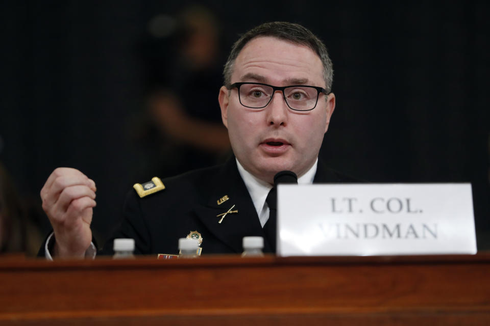 National Security Council aide Lt. Col. Alexander Vindman testifies before the House Intelligence Committee on Capitol Hill in Washington, Tuesday, Nov. 19, 2019, during a public impeachment hearing of President Donald Trump's efforts to tie U.S. aid for Ukraine to investigations of his political opponents. (AP Photo/Andrew Harnik)