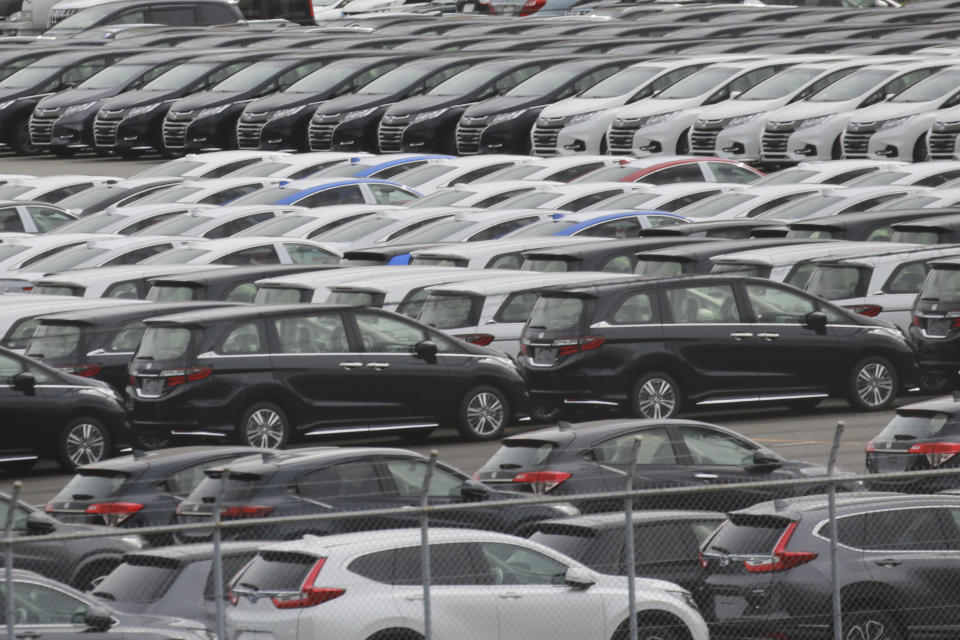 Vehicles wait to be exported at Yokohama port, near Tokyo on Sept. 29, 2020. Japan racked up a trade deficit in April, marking the 21st month in a row of deficits, although it declined dramatically compared to a year ago, as exports recovered, according to government data released Thursday, May 18, 2023. (AP Photo/Koji Sasahara)