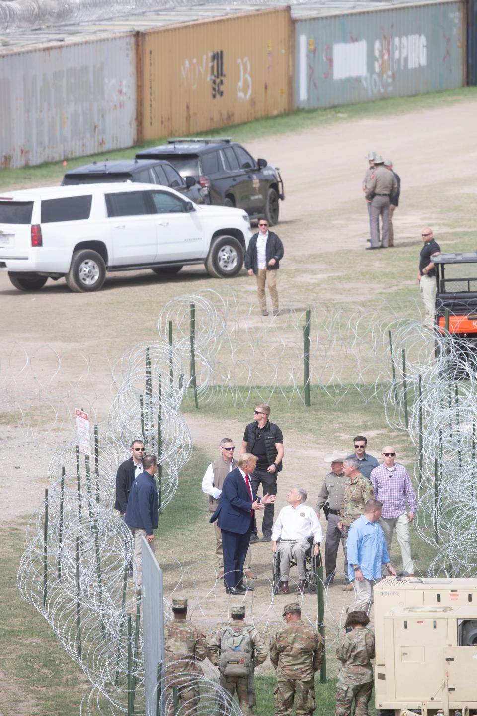 Former president Donald Trump and Gov. Greg Abbott meet at Shelby Park during former president's visit to Eagle Pass, Texas on Feb. 29, 2024.