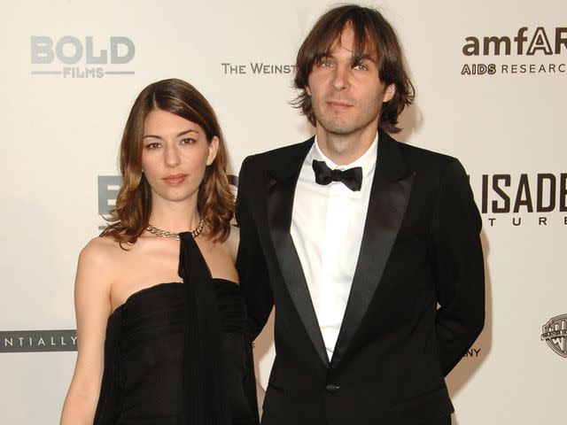 <p>George Pimentel/WireImage</p> Sofia Coppola and Thomas Mars during an amfAR benefit in Cannes, France.