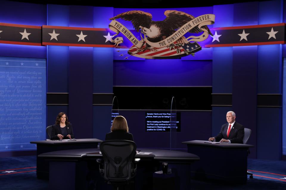 Mike Pence and Kamala Harris take part in vice presidential debate (Getty Images)