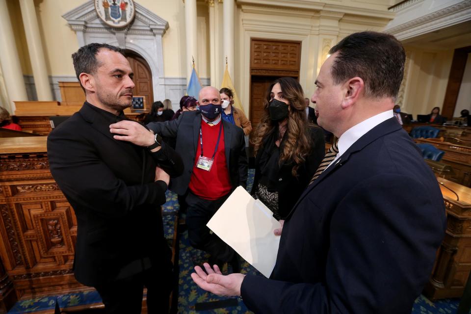 Senate President Nick Scutari (right) speaks with his chief of staff Tony Teixeira in the Assembly Chamber at the State House in Trenton Tuesday, March 8, 2022, before Governor Phil Murphy delivered his Budget Address.