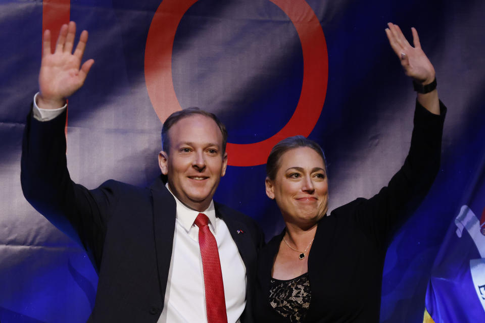 Republican gubernatorial candidate Lee Zeldin appears with his running mate, Alison Esposito, before addressing supporters at his election night party, Tuesday, Nov. 8, 2022, in New York. (AP Photo/Jason DeCrow)