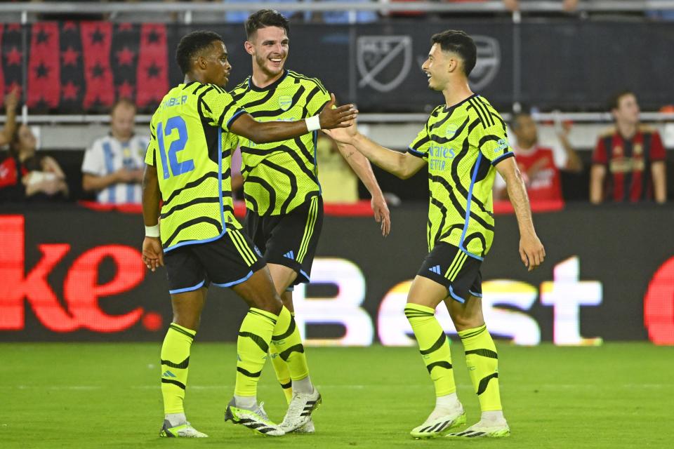 Jul 19, 2023; Washington, DC, USA; Arsenal forward Gabriel Martinelli (right) and defender Jurrien Timber (12) and midfielder Declan Rice (41) celebrate after a goal against MLS during the second half of the 2023 MLS All Star Game at Audi Field. Mandatory Credit: Brad Mills-USA TODAY Sports