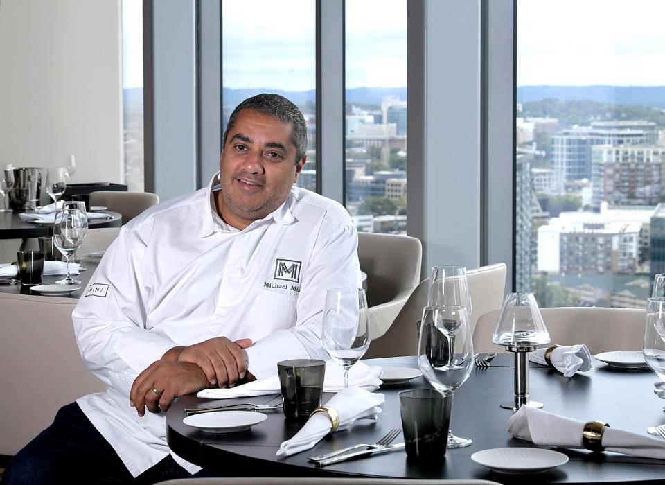 Celebrity chef Michael Mina opens his Bourbon Steak on the 34th floor of the JW Marriott. 