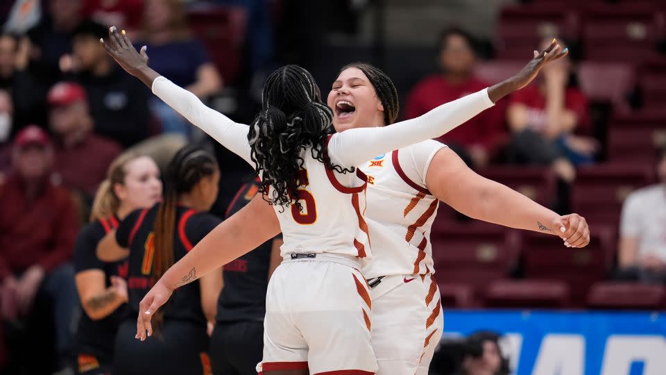 Audi Crooks (right) celebrates with forward Nyamer Diew after scoring against Maryland during the second half. - Godofredo A. Vásquez/AP