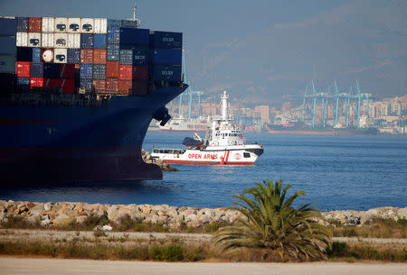 The NGO Proactiva Open Arms rescue boat is seen sailing with migrants rescued in central Mediterranean Sea, to the port of the new Center for Temporary Assistance to Foreigners (CATE) in San Roque, near Algeciras, southern Spain August 9, 2018. REUTERS/Jon Nazca