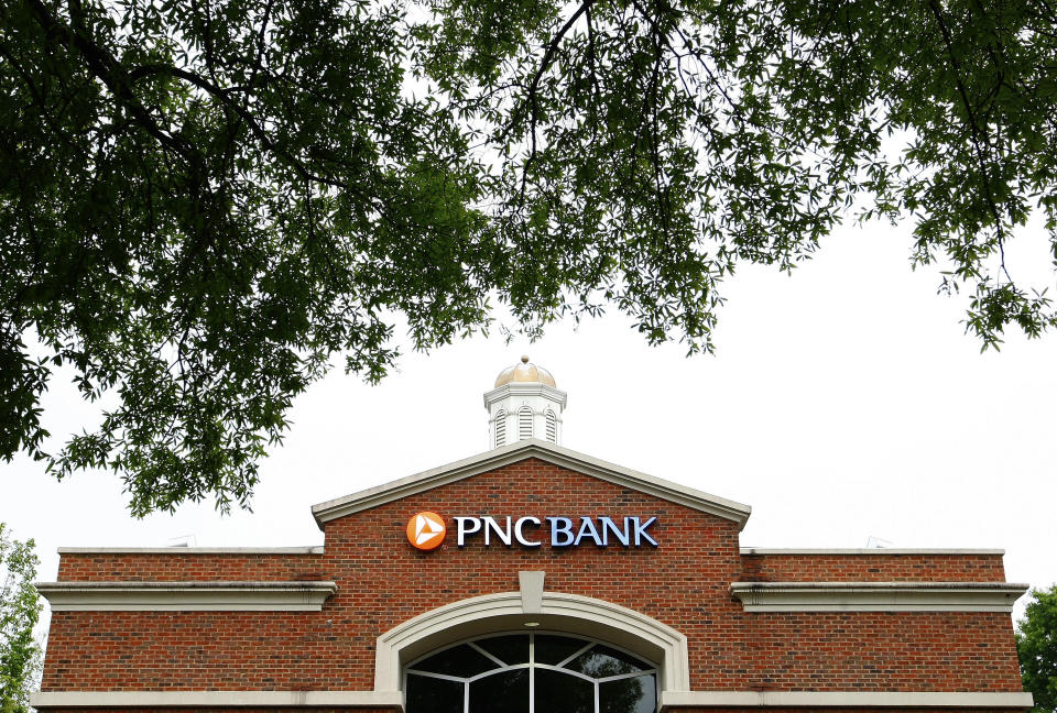 A PNC Bank branch is shown in Charlotte, North Carolina April 18, 2012. PNC Financial Services Group Inc posted a lower first-quarter profit as it absorbed merger expenses but managed to beat analysts' expectations on improved credit quality. REUTERS/Chris Keane (UNITED STATES - Tags: BUSINESS)