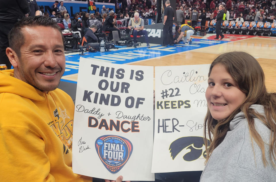 Kaitlyn Varela and her father, Jesus, traveled from Orange County, Calif., to watch Kaitlyn Clark's last college game.  (Photo: Cassandra Negley/Yahoo Sports)