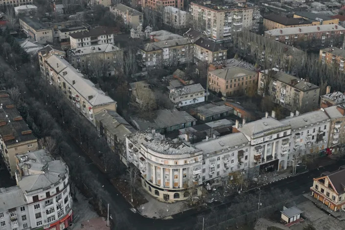 An aerial view of Bakhmut, the site of the heaviest battles with the Russian troops, in the Donetsk region, Ukraine, Friday, Dec. 9, 2022. (AP Photo/LIBKOS)