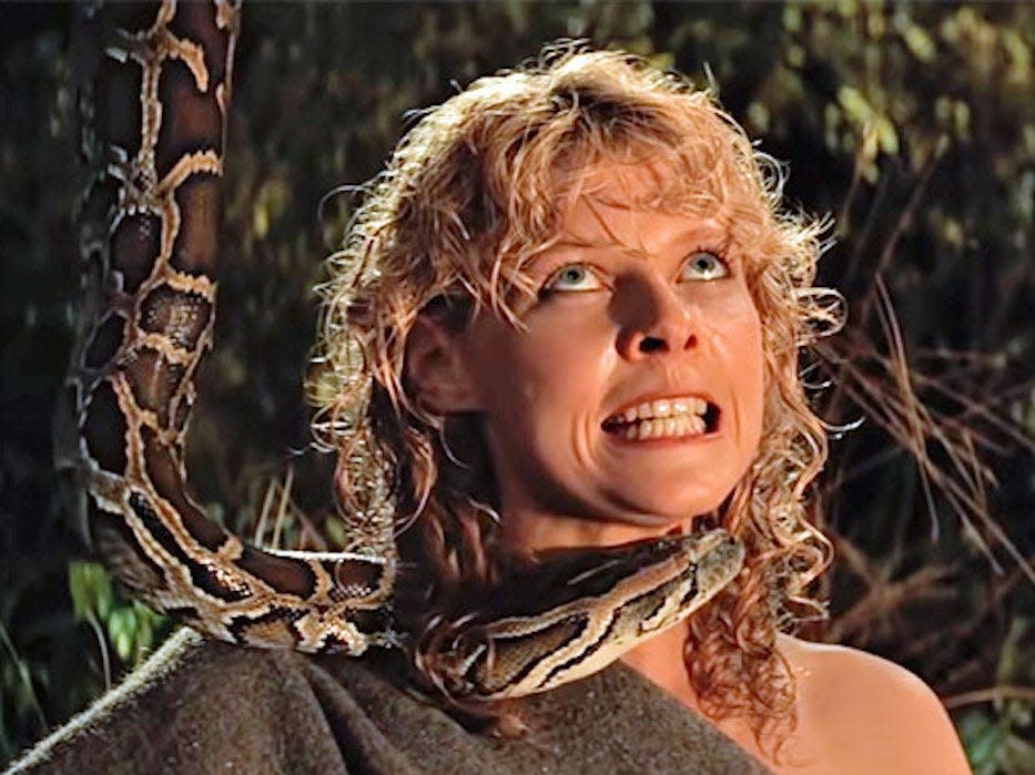 Kate Capshaw as Willie Scott with a snake around her neck in "Indiana Jones and the Temple of Doom."