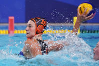 Netherland's Ilse Koolhaas shoots against South Africa during a preliminary round women's water polo match at the 2020 Summer Olympics, Friday, July 30, 2021, in Tokyo, Japan. (AP Photo/Mark Humphrey)