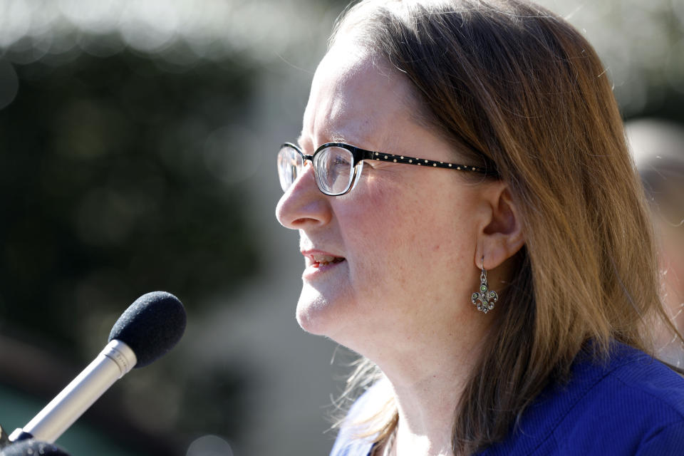 Mary Woodward, Chancellor of the Catholic Diocese of Jackson, speaks to reporters about their releasing names of clergy members it says have been credibly accused of sexual abuse on its website, during a news conference in the parking lot of The Cathedral of St. Peter the Apostle Catholic Church, in Jackson, Miss., Tuesday, March 19, 2019. (AP Photo/Rogelio V. Solis)