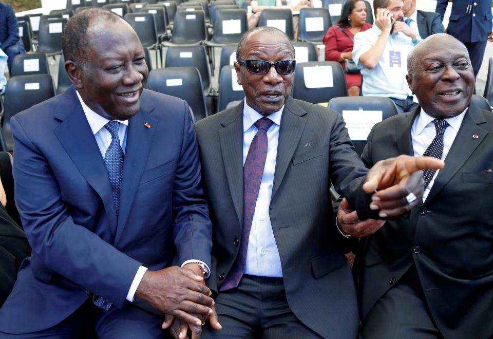 Ivory Coast's President Alassane Ouattara (L) and Guinean President Alpha Conde attend a ceremony marking the 75th anniversary of the Allied landings in Provence during World War II, in Saint-Raphael, south eastern France, on August 15, 2019. (Photo by ERIC GAILLARD / POOL / AFP)        (Photo credit should read ERIC GAILLARD/AFP/Getty Images)