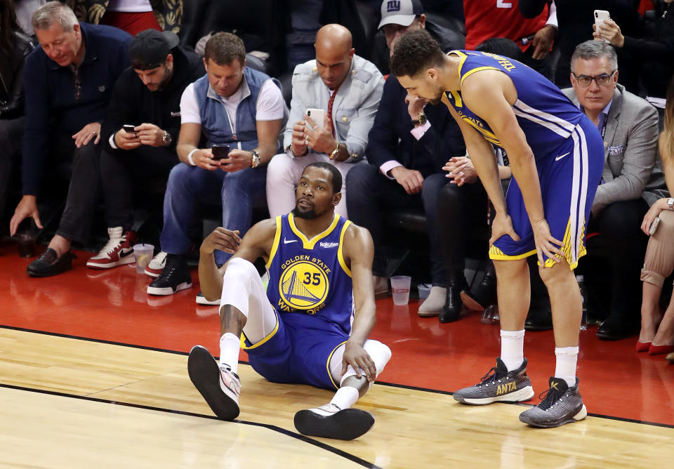 TORONTO, ONTARIO - JUNE 10:  Kevin Durant #35 of the Golden State Warriors reacts against the Toronto Raptors in the first half during Game Five of the 2019 NBA Finals at Scotiabank Arena on June 10, 2019 in Toronto, Canada. NOTE TO USER: User expressly acknowledges and agrees that, by downloading and or using this photograph, User is consenting to the terms and conditions of the Getty Images License Agreement. (Photo by Claus Andersen/Getty Images)