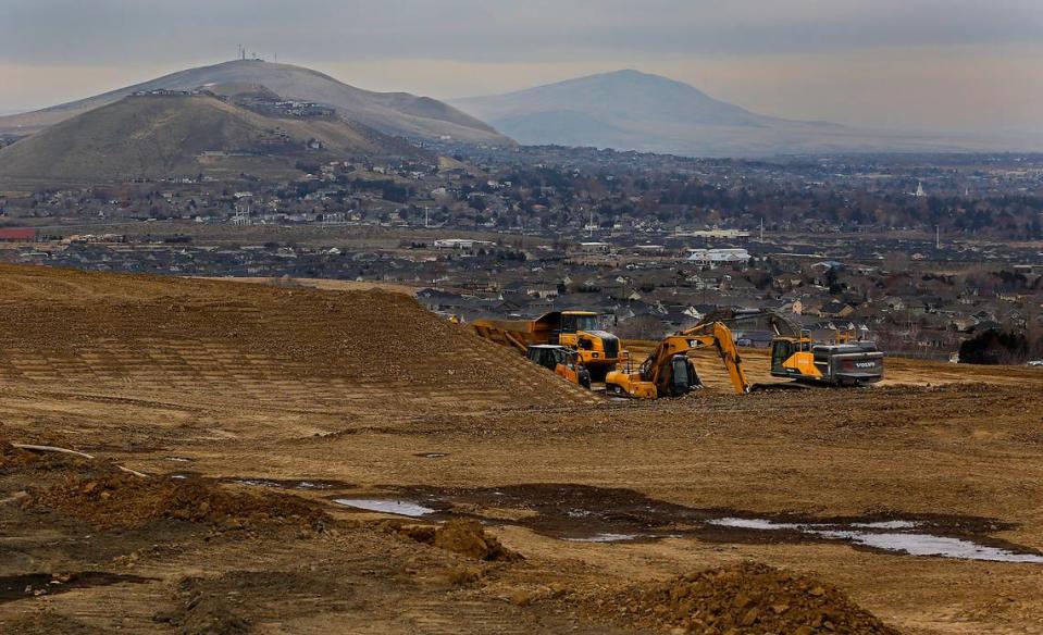 Outlines of new roads and residential lots are being scratched out of the dirt on the west end of the north face of Thompson Hill in Kennewick.