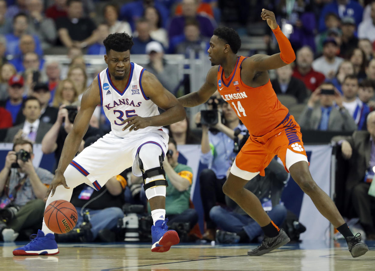 Kansas’ Udoka Azubuike (35) scored 14 points and grabbed 11 rebounds in a Sweet 16 win over Clemson. (AP Photo/Charlie Neibergall)